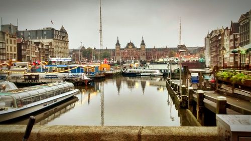 Boats moored at harbor