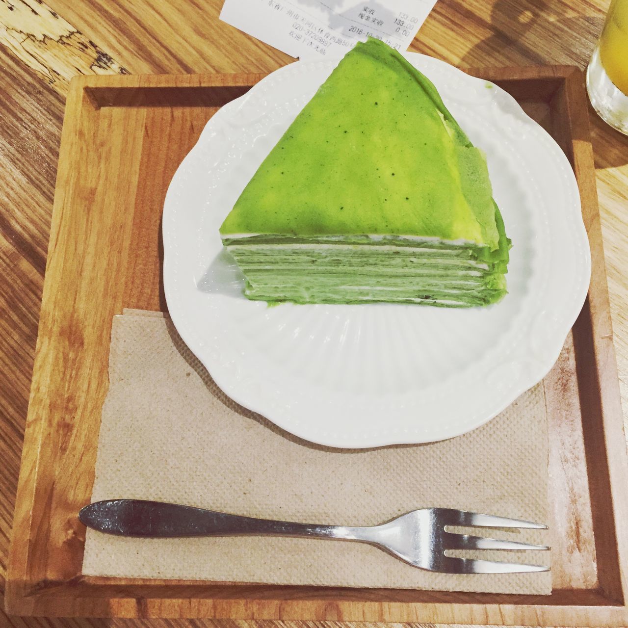 food and drink, food, slice, indoors, healthy eating, table, high angle view, bread, freshness, wood - material, cutting board, plate, cheese, green color, ready-to-eat, sliced