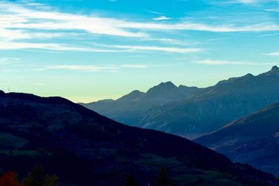 Scenic view of mountains against sky during sunset