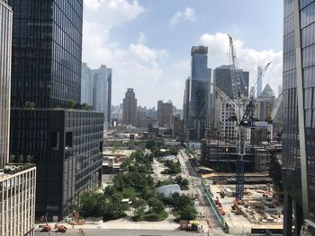 Modern buildings in city against sky