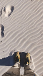 Wearing sneakers in the desert