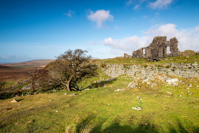 View of old ruin building against cloudy sky