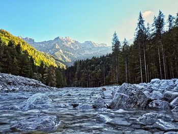 Scenic view of snowcapped mountains against clear sky