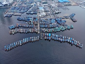 High angle view of illuminated pier at beach