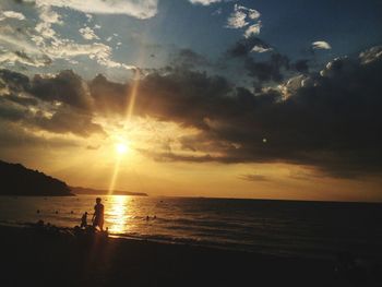 Scenic view of sea at sunset