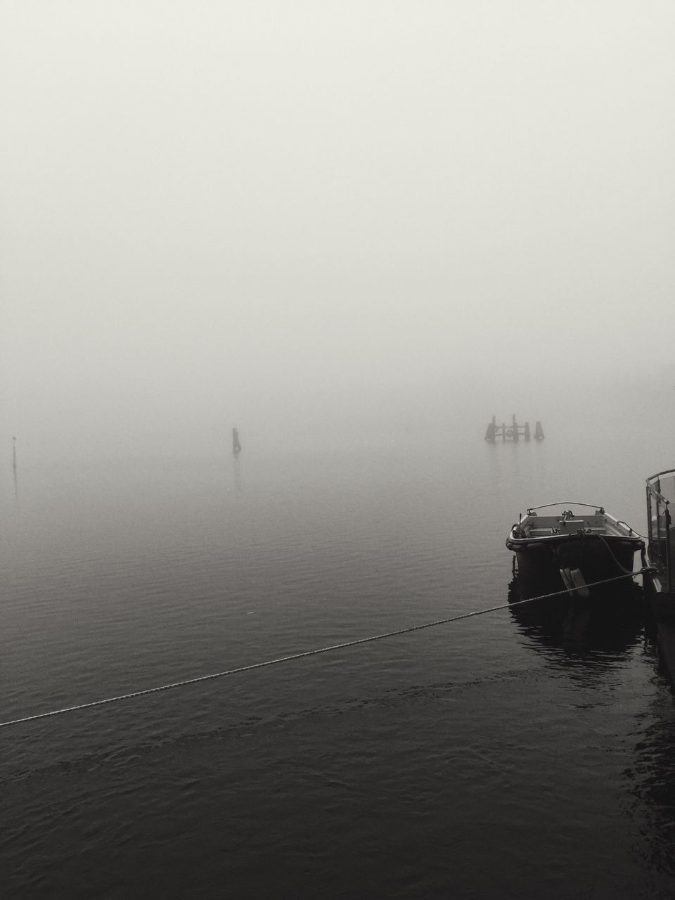 SCENIC VIEW OF LAKE DURING FOGGY WEATHER