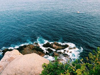 Scenic view of sea against blue sky