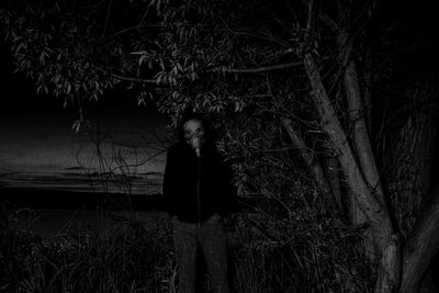 Close-up of woman standing in pond