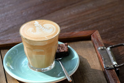 Close-up of coffee served on table