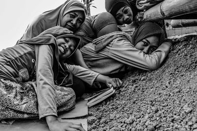 Family on hijab on field