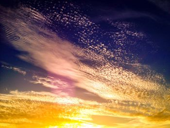 Scenic view of dramatic sky during sunset