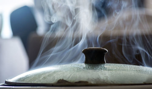 Close-up of smoke emitting from camera