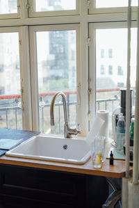 Sink by window at home