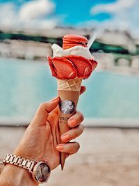 Midsection of person holding ice cream