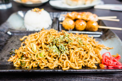 Close-up of noodles in plate on table
