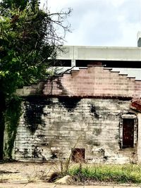 Low angle view of old building against sky