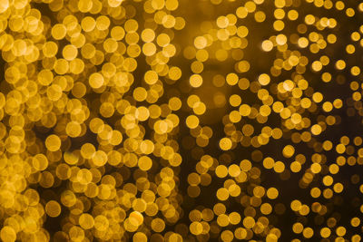 Defocused image of yellow lights