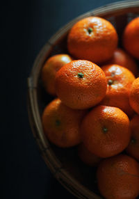 High angle view of orange in basket