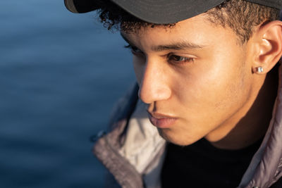 Close-up of young woman looking away