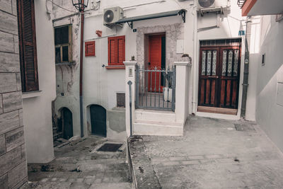 Alley amidst buildings in city