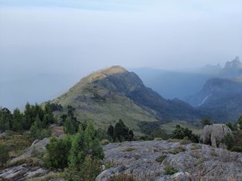 Beautiful scenic view from kodanad view point ooty of misty rain cloud hill mountain green forest