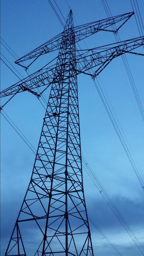 low angle view, power line, electricity pylon, electricity, power supply, connection, cable, fuel and power generation, technology, blue, sky, clear sky, complexity, power cable, electricity tower, outdoors, no people, silhouette, tall - high, day