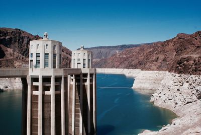 Hoover dam on colorado river against sky