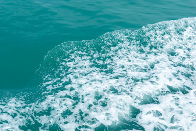 High angle view of water splashing in sea