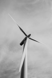 Low angle view of wind turbine against sky