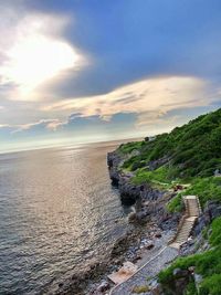 Scenic view of sea against cloudy sky