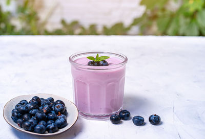 Close-up of drink served on table