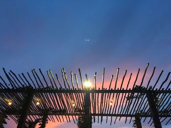 Low angle view of built structure against sky at night