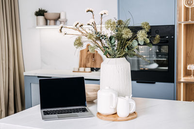 Close-up of laptop on table