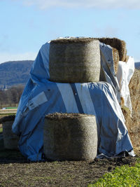 Built structure on field against sky