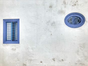 Close-up of text on wall of building