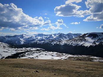 Scenic view of snowcapped mountains against sky