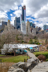 Buildings in city against sky