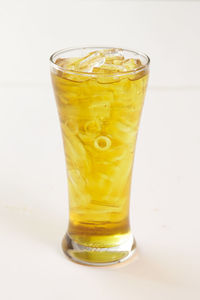 Close-up of drink against white background