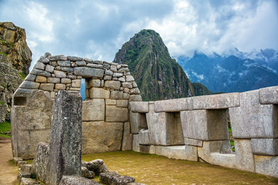 Built structure with mountains in background