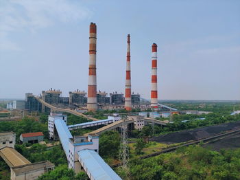 View of factory against sky