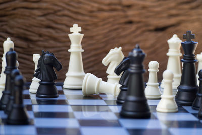 Close-up of chess pieces on board