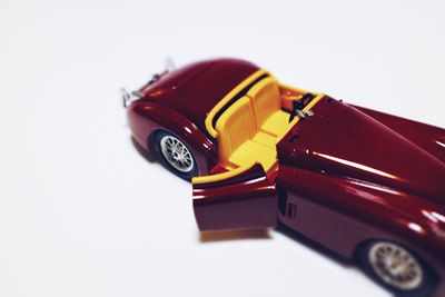 Close-up of toy car against white background