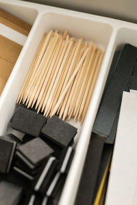 Close-up of make-up brushes on table