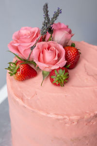 Close-up of pink roses on table