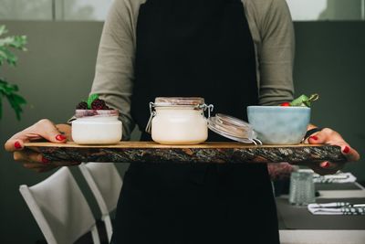 Close-up of hand holding ice cream