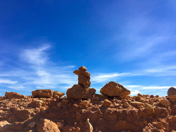 Rock formations against blue sky