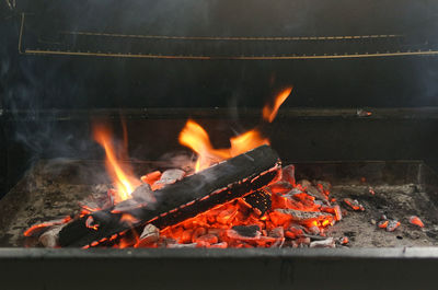 Close-up of fire burning in wood