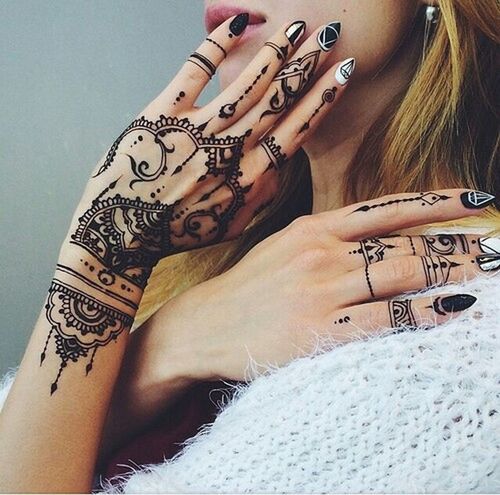 text, lifestyles, western script, communication, leisure activity, creativity, art, person, art and craft, young adult, young women, graffiti, tattoo, human representation, long hair, day