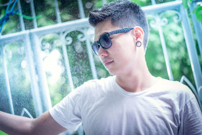 Portrait of young man looking away