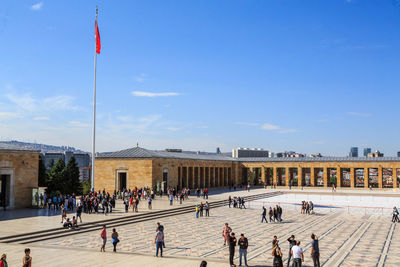 Group of people in front of building